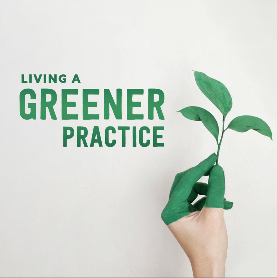 LIVING A GREENER PRACTICE WITH A HAND HOLDING A LEAF