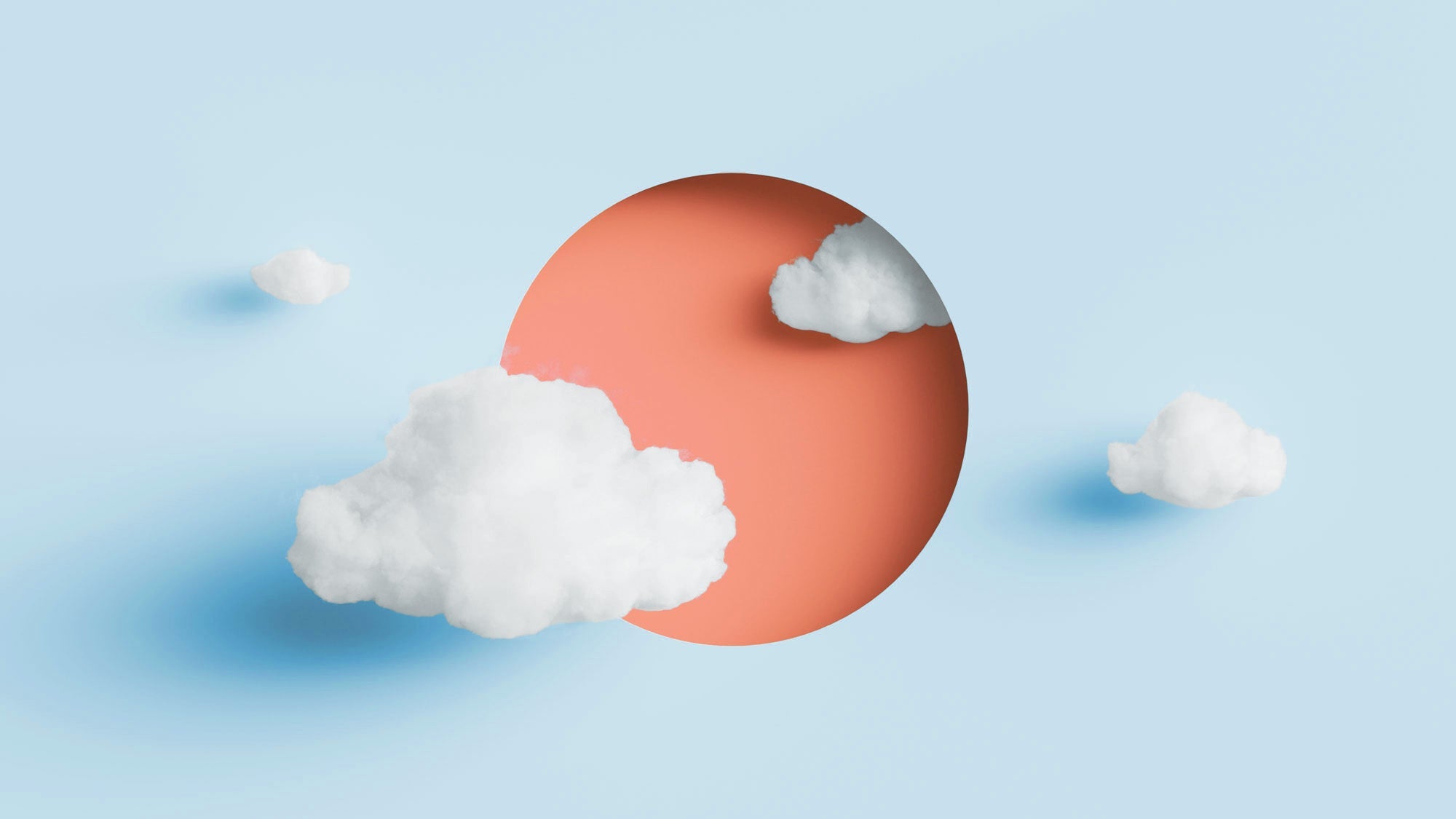 creative representation of the sun, sky and clouds made from paper and other art materials