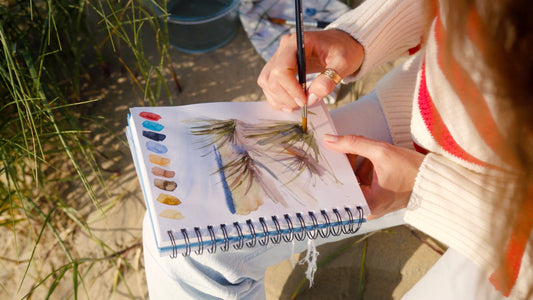 Ilona painting the beach en plein air