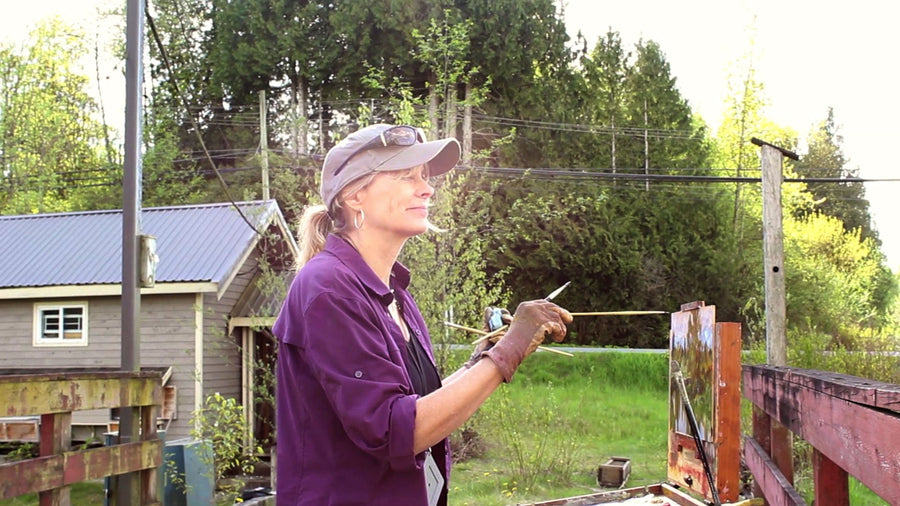 Artist Gaye Adams painting outdoors on location.