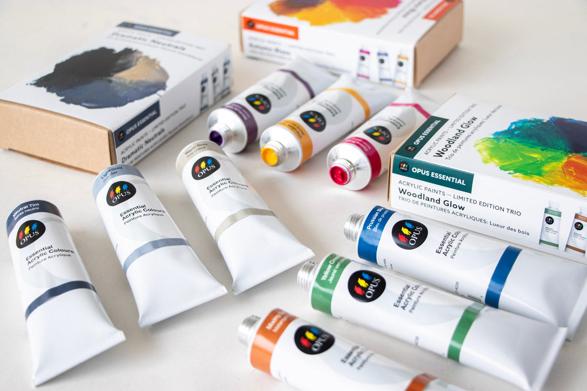a photograph of the 3 new Opus Essential Acrylic Trio Sets with the tubes from each arranged outside of the boxes