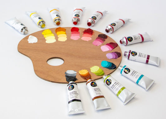 Image of a wooden palette with all 12 of the NEW Opus Essential Oil Colours painted out from straight out of the tube, and gradually lightened with white. 