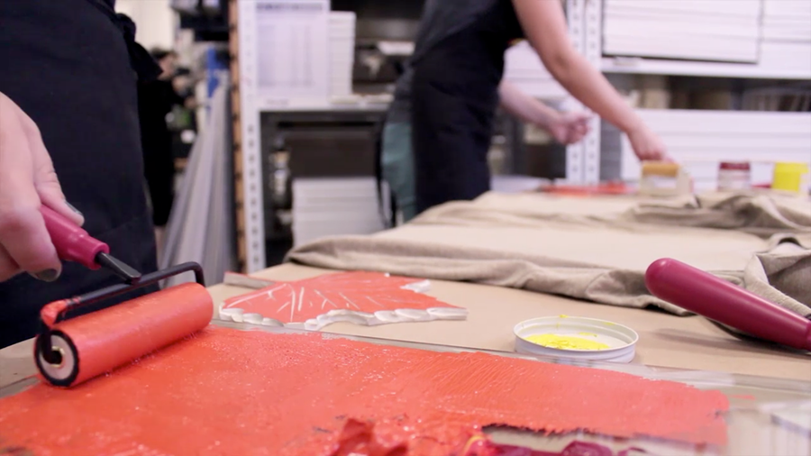 Rolling ink onto a block for block printing