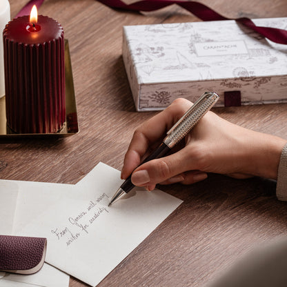 Writing a card with the Caran d'Ache Toile de Jouy Léman ballpoint pen