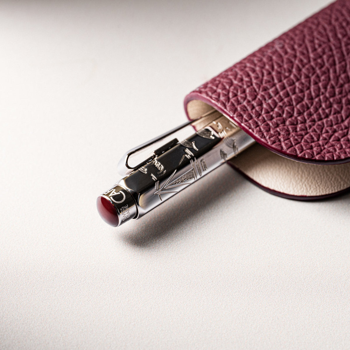 Caran d'Ache Toile de Jouy Ecridor pen in its burgundy leather holder