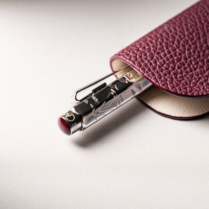 Caran d'Ache Toile de Jouy Ecridor pen in its burgundy leather holder